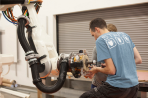 Estimating the impact of robots on productivity and employment